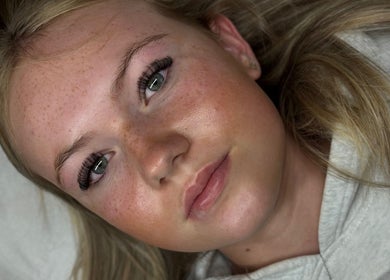 Close-up of a person's face with flawless makeup at Bronzed Beauty, Bangor, Northern Ireland, GB.