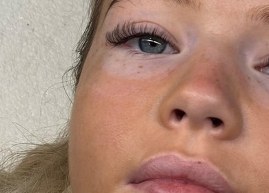 Close-up of a woman's eye showcasing eyelash extension at Bronzed Beauty, Bangor, Northern Ireland, GB.