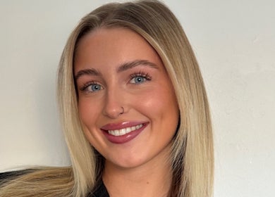 Radiant smile of a person at Refined by Rhianna, Bangor, Northern Ireland, GB.