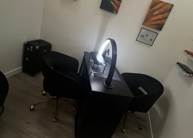 Elegant nail station at Clawed and Polished, Redlands, California, US, showcasing a sleek manicure setup.