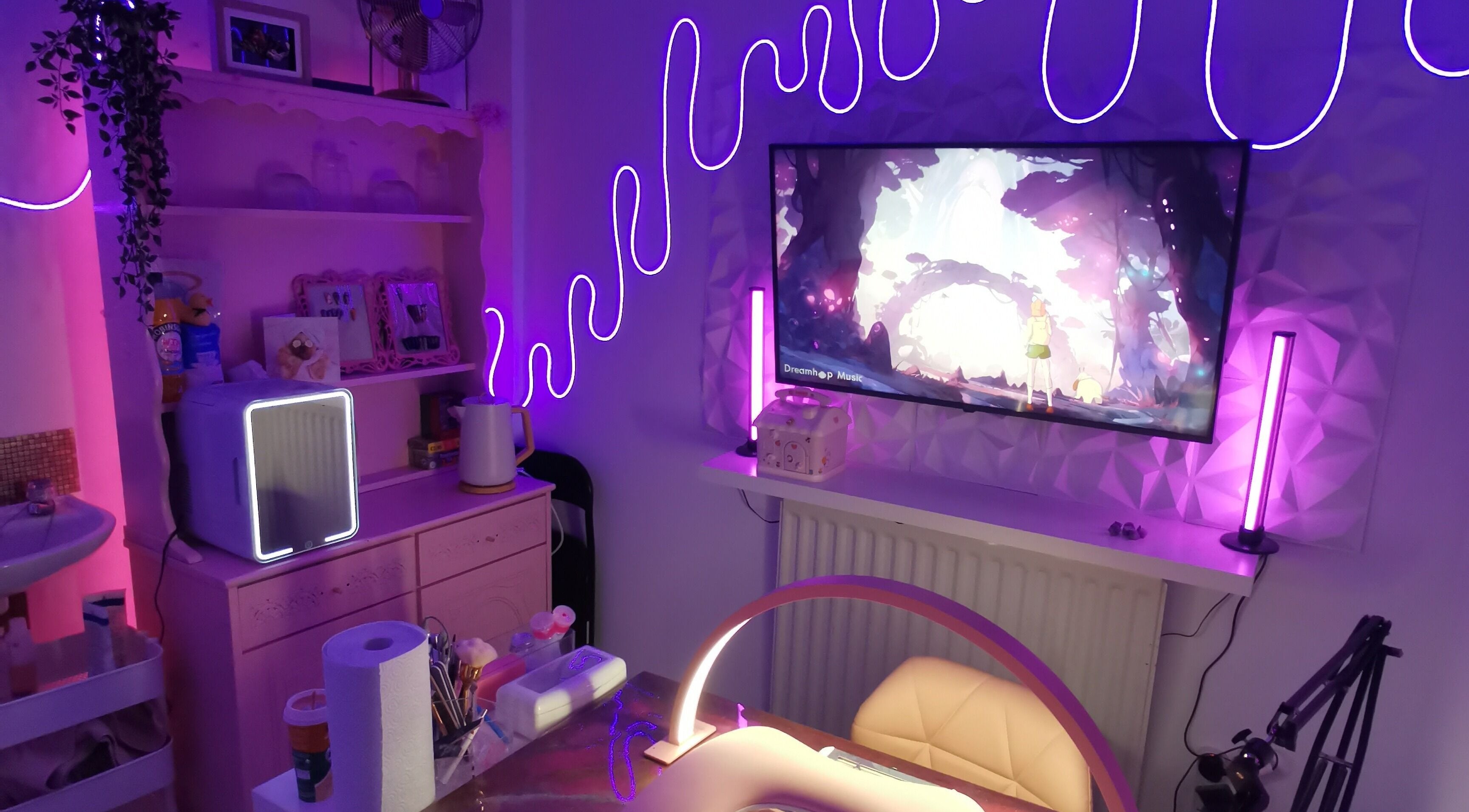 Stylish violet-toned interior of Nebula Rose Nails, Castleford, England, GB featuring modern decor.