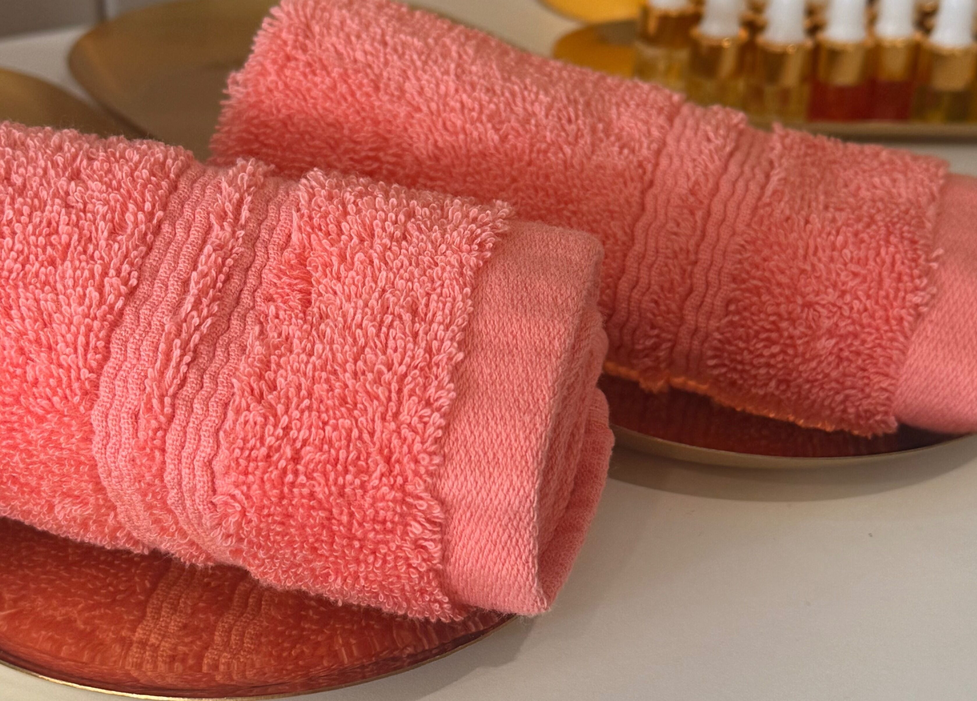 Coral towels at Bold Beauty Crew, Pakenham, Victoria, AU, offering a luxe wellness experience.