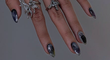 Intricate nail art with butterfly rings at Secret Butterfly Nails and Beauty, Sydney, New South Wales, AU.
