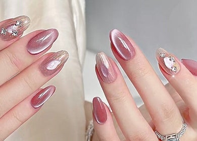 Elegant nail art at Secret Butterfly Nails and Beauty, Sydney, New South Wales, AU. Shimmering with rhinestones.