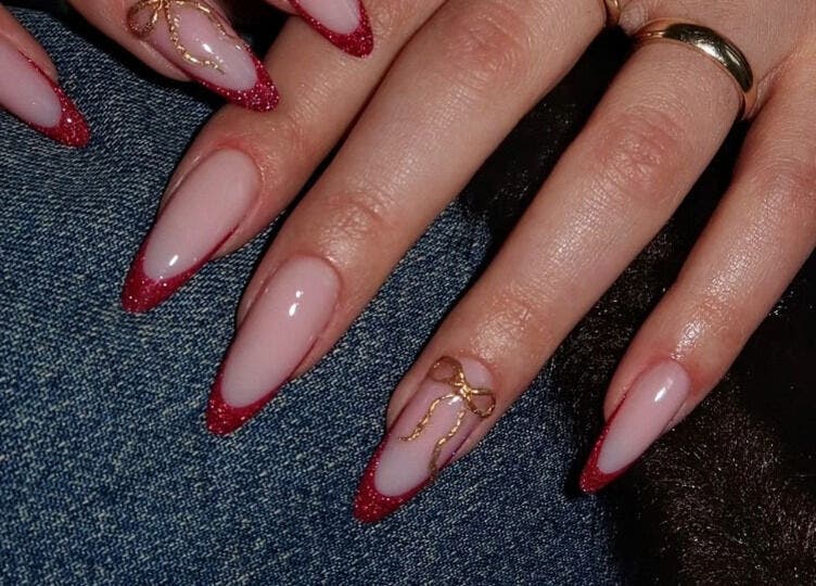 Elegant red French manicure at Secret Butterfly Nails and Beauty in Sydney, New South Wales, AU.