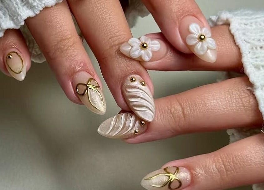 Elegant 3D floral nail art at Secret Butterfly Nails and Beauty, Sydney, New South Wales, AU.