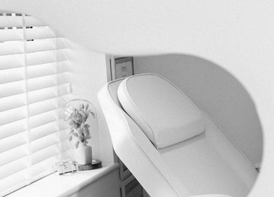 Relaxing treatment chair at MW Clinic in Whitehill, England, GB with soothing decor and soft lighting.