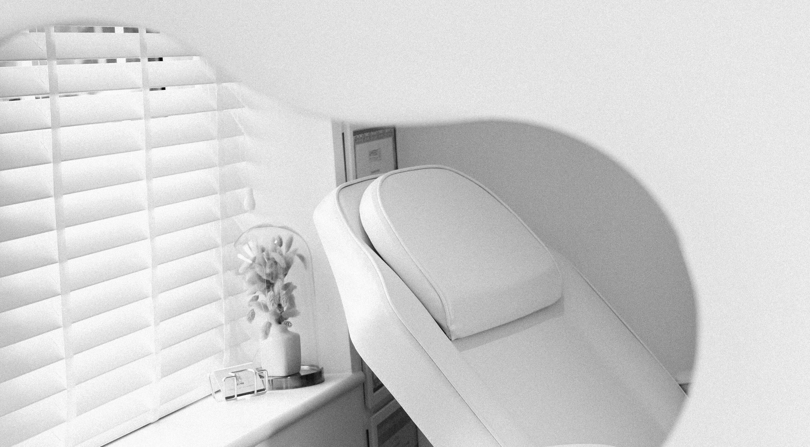 Relaxing treatment chair at MW Clinic in Whitehill, England, GB with soothing decor and soft lighting.