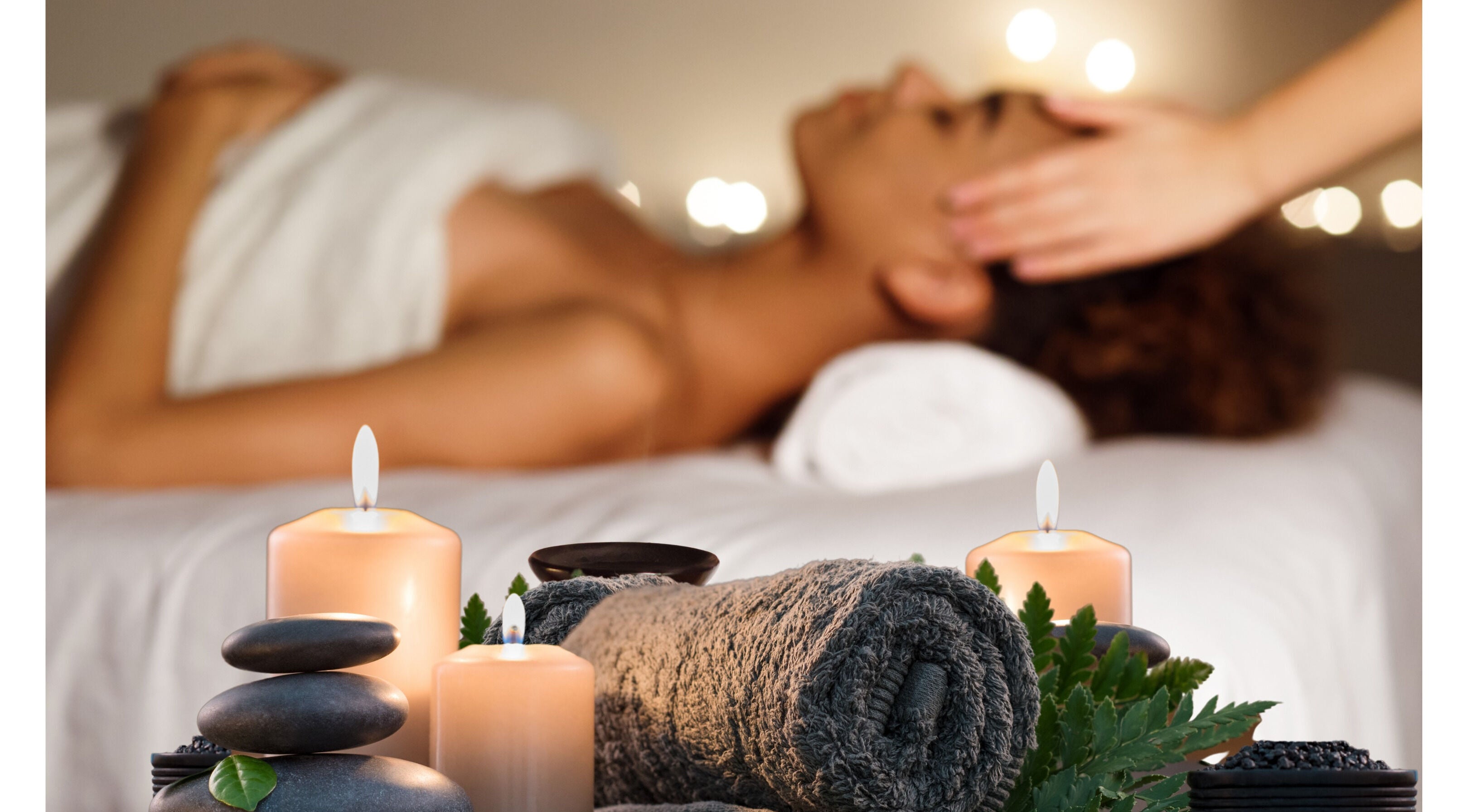 Relaxing massage at Alpha Energy Wellness in Cape Town, Western Cape, ZA with candles and soft lighting.