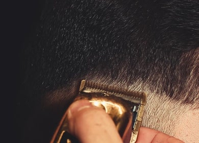 Close-up of a detailed haircut at Familia Es Todo, Amman, Amman Governorate, JO highlighting precision styling.