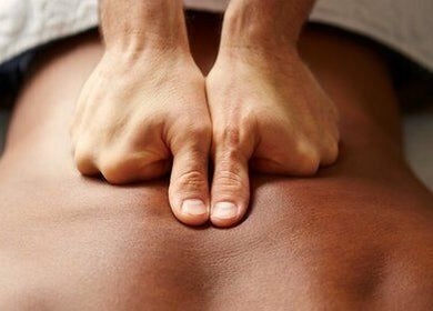Close-up of relaxing massage at Stephanie Hunter, Hamilton, Waikato, NZ, focusing on hands applying pressure.