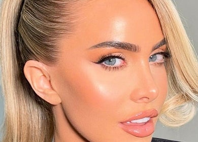 Blonde hairstyle with sleek finish at Lewis Hair Stylist, Radcliffe, England, GB.
