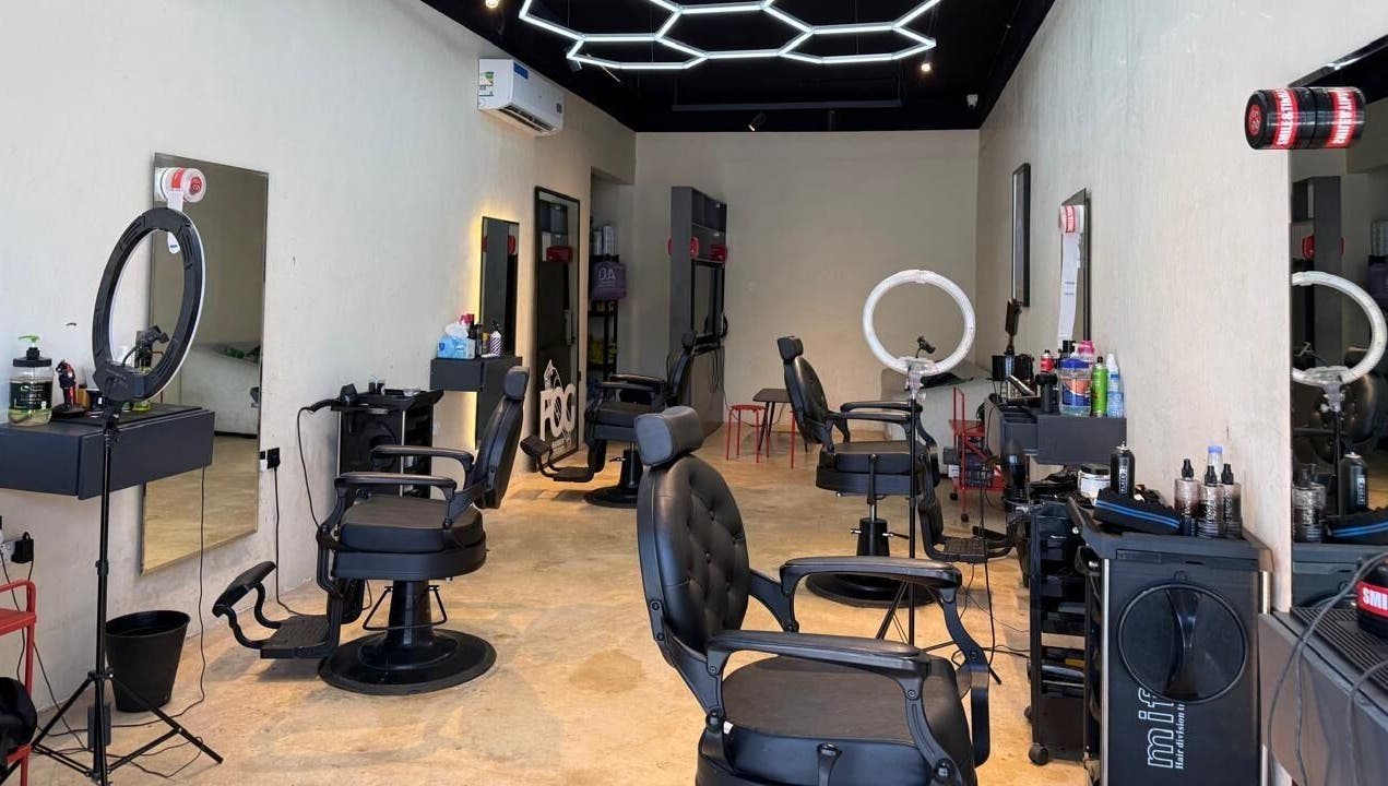 Modern barber chairs and tools at Fog Barber Studio, Riyadh, Riyadh Province, SA showcasing a sleek setup.