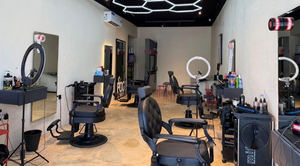 Modern barber chairs and tools at Fog Barber Studio, Riyadh, Riyadh Province, SA showcasing a sleek setup.