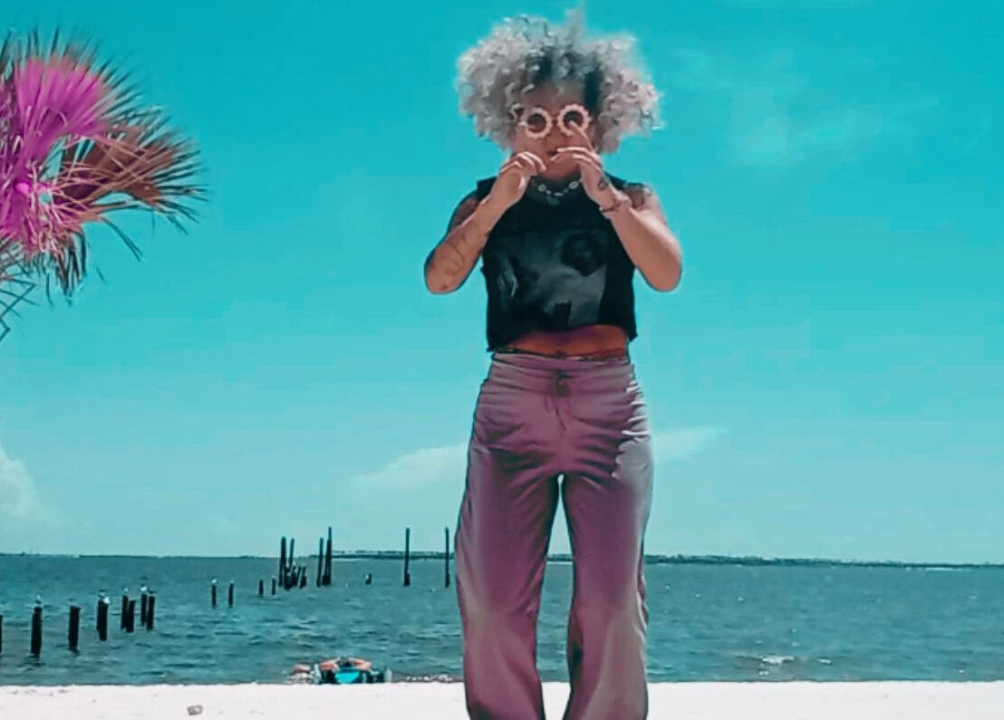 Relaxing beach scene with vibrant vibe at Kathryn Lane, NASM CPT, CNC, MWC in Ocean Springs, Mississippi, US.