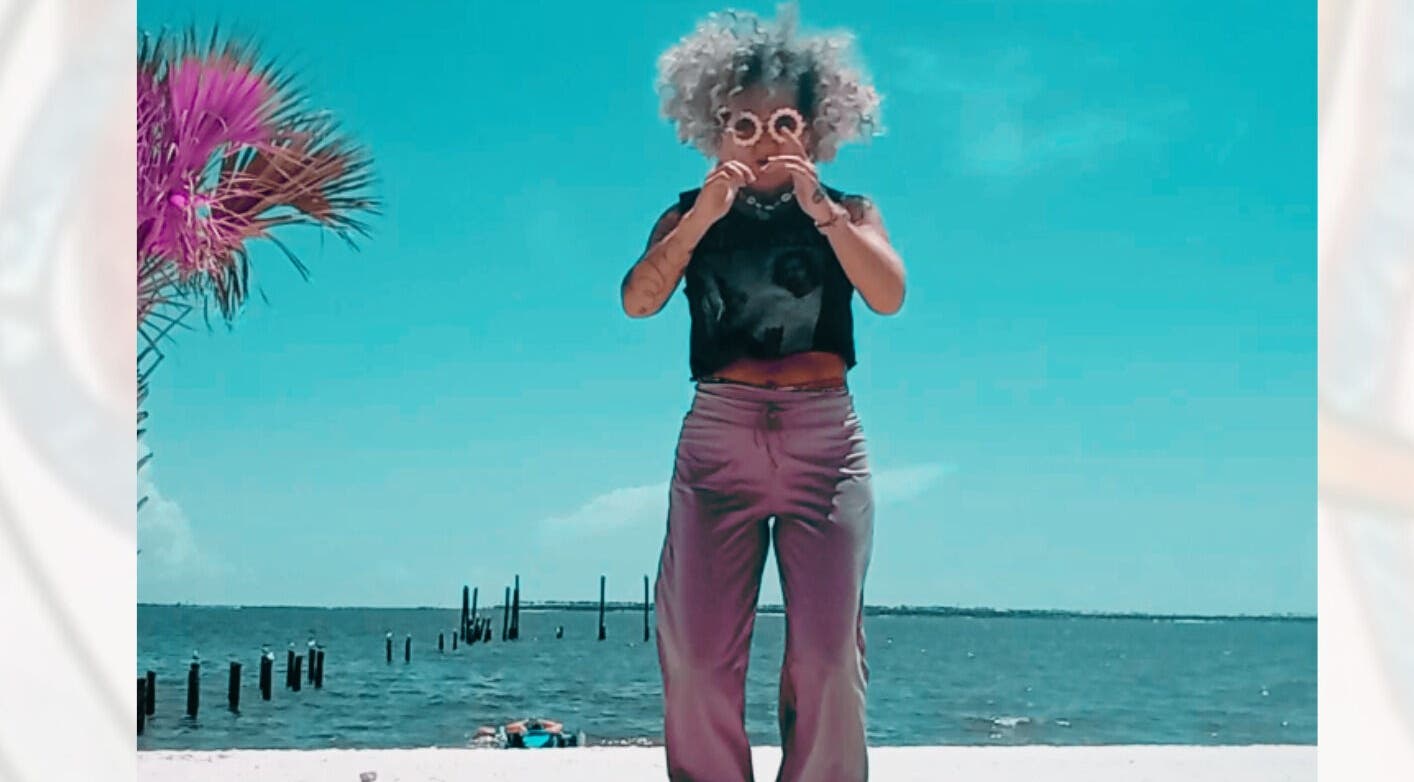 Relaxing beach scene with vibrant vibe at Kathryn Lane, NASM CPT, CNC, MWC in Ocean Springs, Mississippi, US.