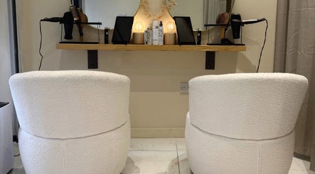 Elegant styling chairs at Head Space Manchester, a premier salon in Manchester, England, GB.