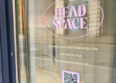 Entrance view of Head Space Manchester, showing its welcoming signage in Manchester, England, GB.