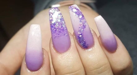 Stunning purple ombre nails with glitter by Nails By Kaili-Jade in Nuneaton, England, GB.