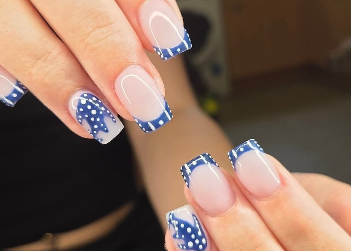 Stylish blue and white polka dot nails at Nails By Kaili-Jade, Nuneaton, England, GB.