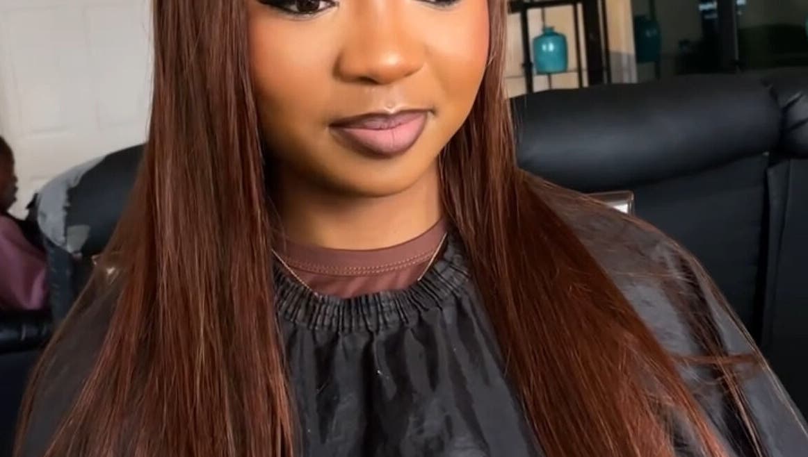 Client enjoys hair styling at Beats By Sange in Cape Town, Western Cape, ZA for a stunning makeover.