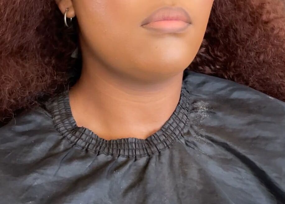 Client receiving makeup at Beats By Sange, Cape Town, Western Cape, ZA.