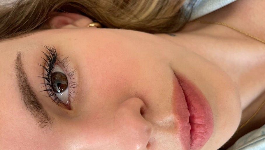 Close-up of eye with flawless lashes at Koi Beauty London, London, England, GB.