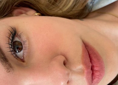 Close-up of eye with flawless lashes at Koi Beauty London, London, England, GB.