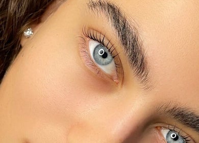 Close-up of an eye with elegant lashes, highlighting Koi Beauty Oxford's expertise in Oxford, England, GB.
