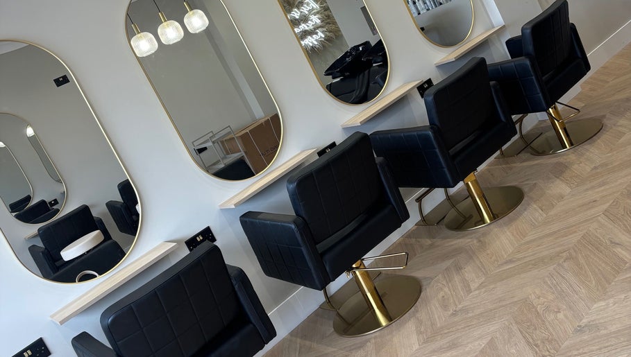 Elegant styling chairs and mirrors at Nevada Hair Studio, Edinburgh, Scotland, GB, showcasing modern design.