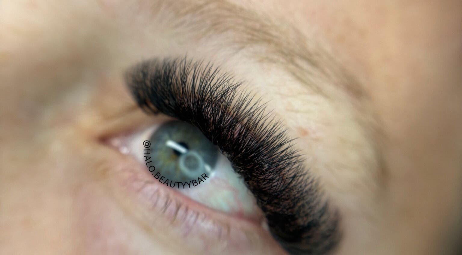 Close-up of expertly applied eyelashes at Halo Beauty Bar, Mudgeeraba, Queensland, AU.