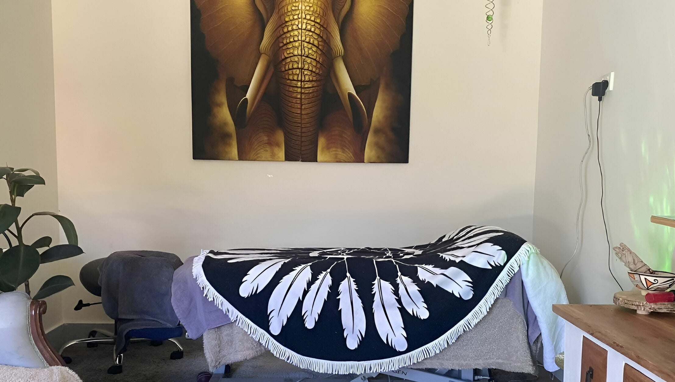 Cozy massage room at Essentially U Massage, New South Wales, New South Wales, AU with elegant decor.