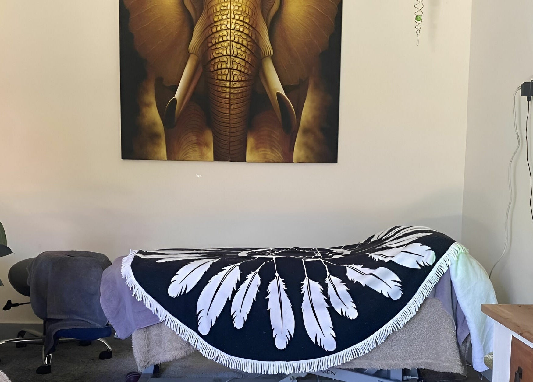 Cozy massage room at Essentially U Massage, New South Wales, New South Wales, AU with elegant decor.