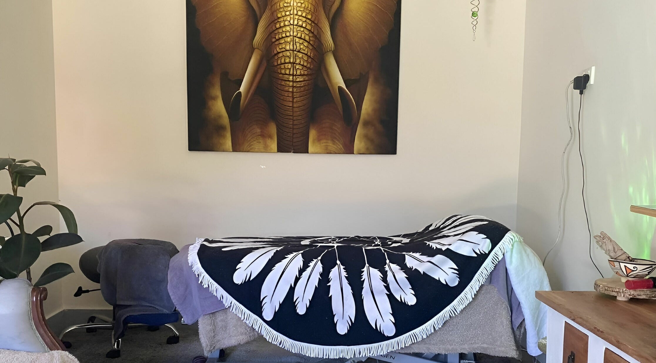 Cozy massage room at Essentially U Massage, New South Wales, New South Wales, AU with elegant decor.