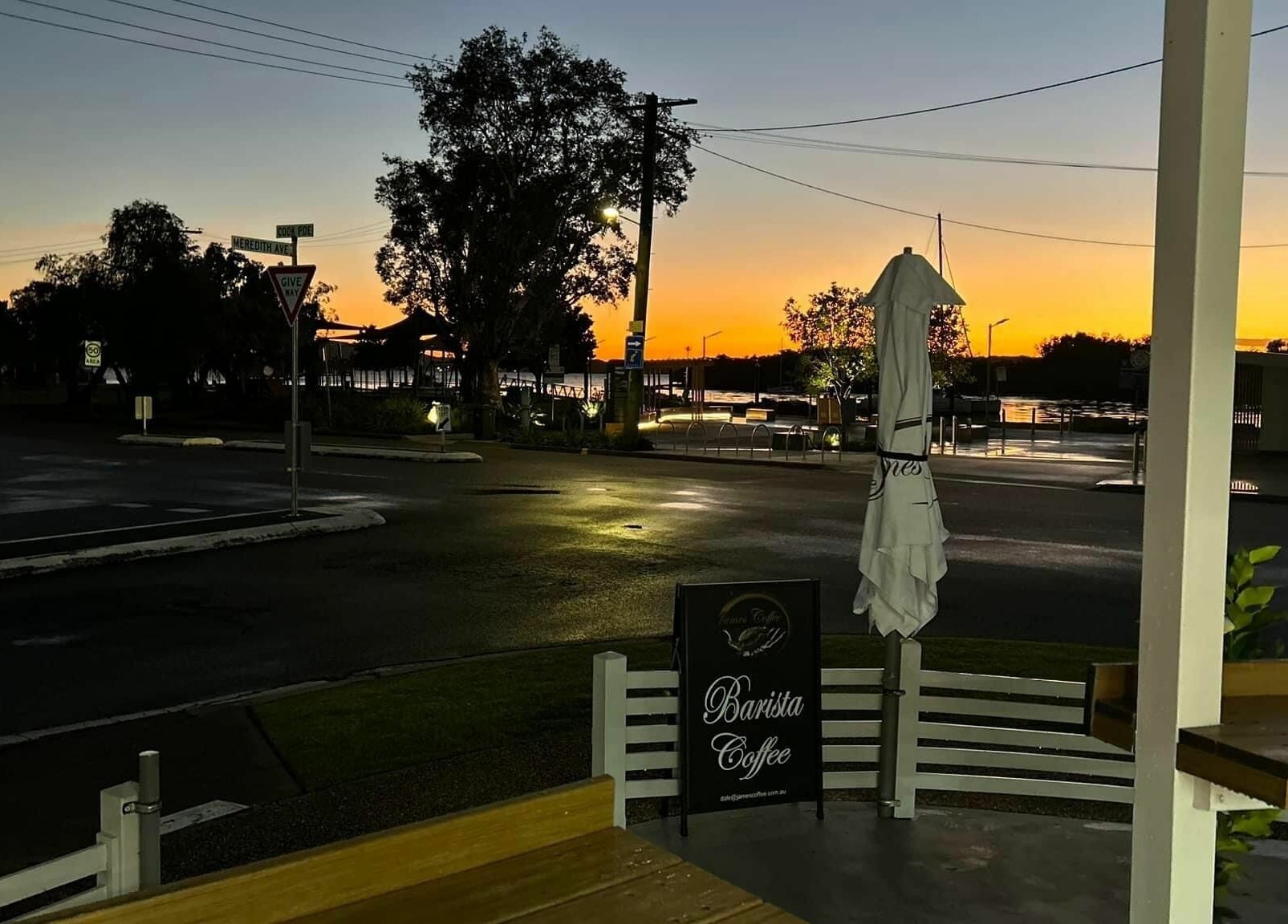 Serene twilight near Essentially U Massage in New South Wales, AU with a peaceful street and sunset.