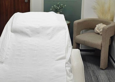 Relaxing treatment bed at Diamond Luxe Aesthetics in Uxbridge, England, GB, offering premium wellness services.