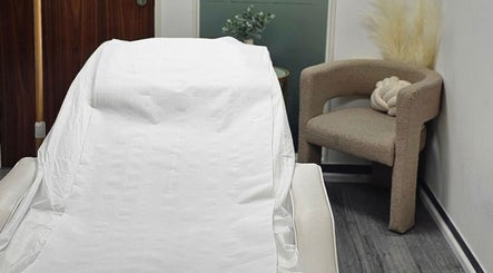 Relaxing treatment bed at Diamond Luxe Aesthetics in Uxbridge, England, GB, offering premium wellness services.