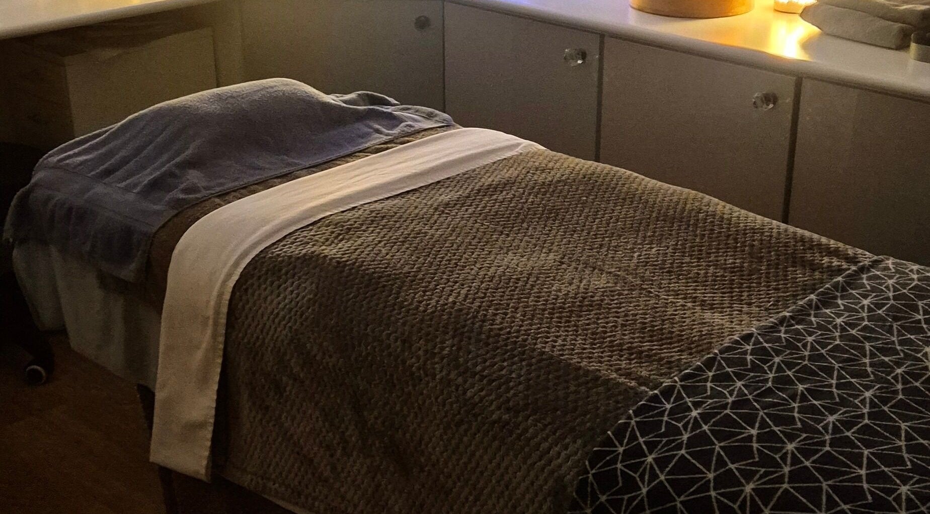Relaxing massage table setup with cozy blankets at Soul Rescue Holistic, Telford, England, GB.