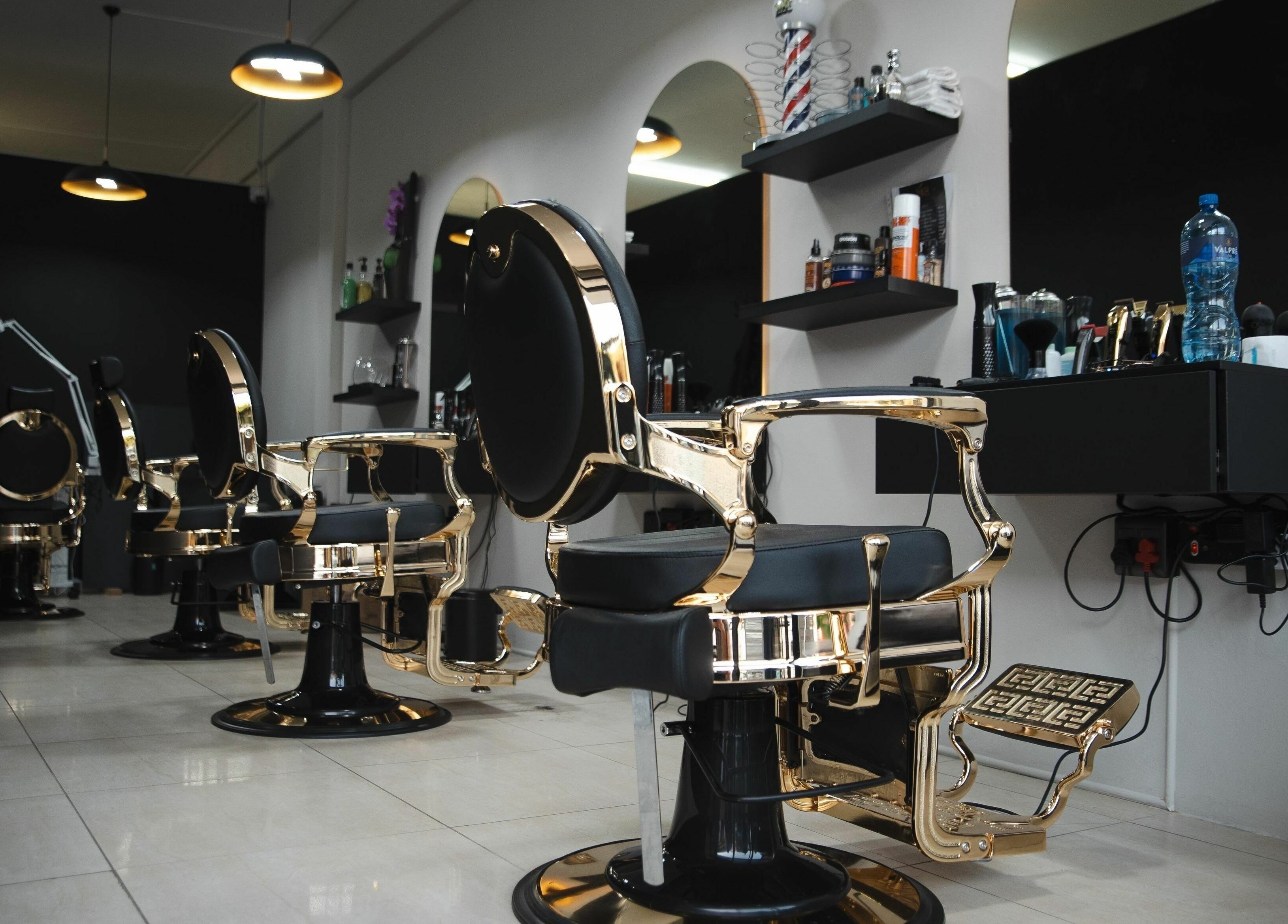 Luxurious salon interior with gold-trimmed chairs at Mkh Beauty House, Johannesburg, Gauteng, ZA.