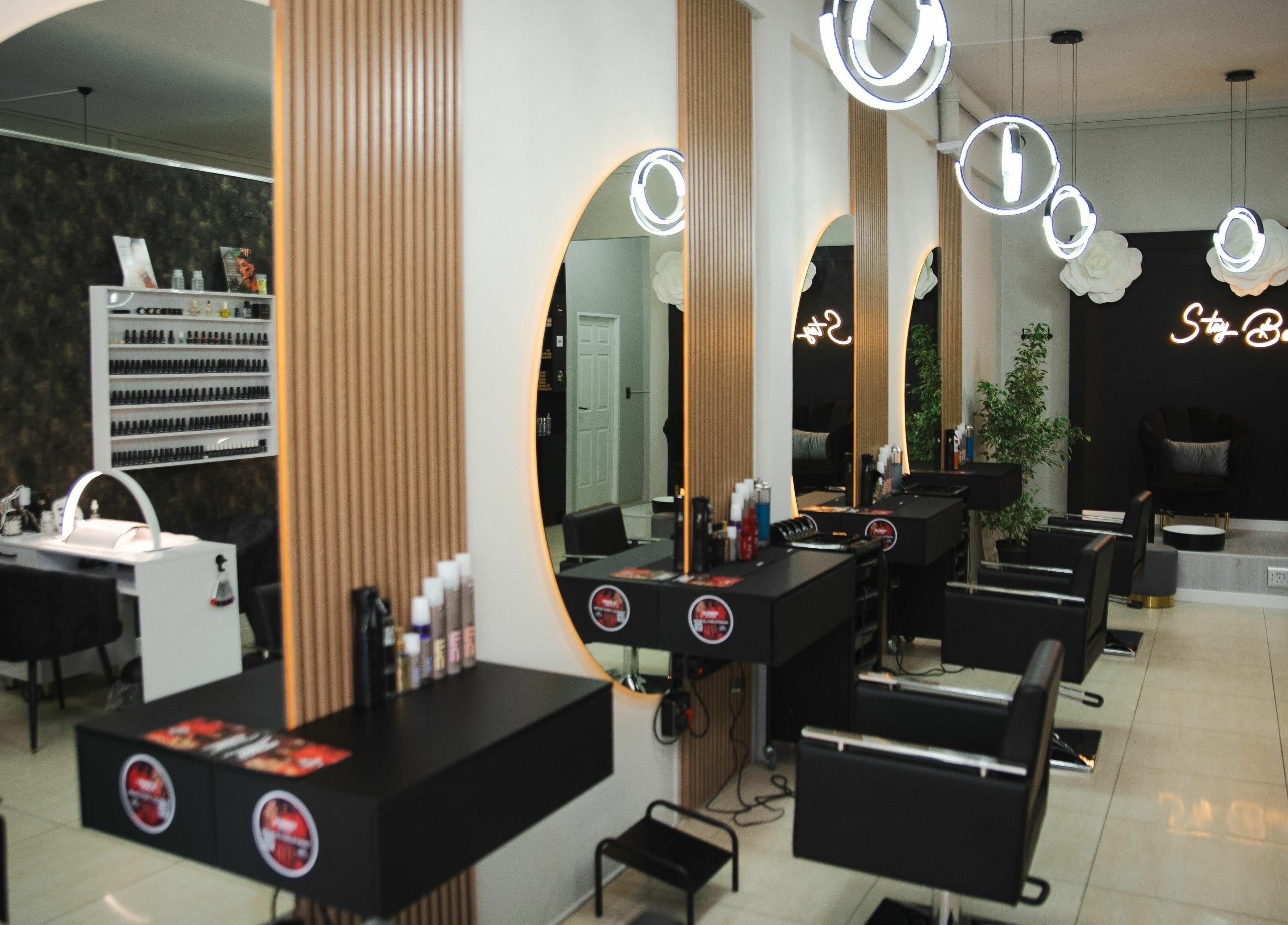 Modern salon interior at Mkh Beauty House, Johannesburg, Gauteng, ZA, featuring stylish décor and seating.