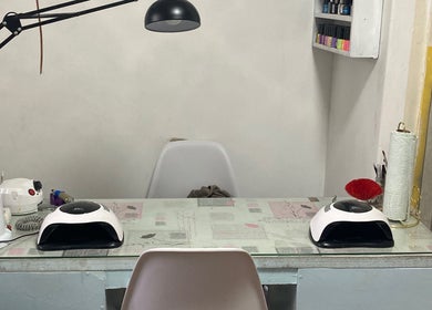 Manicure station at SK Nail and Beauty Bar, Soweto, Gauteng, ZA. Features stylish equipment for nail care.