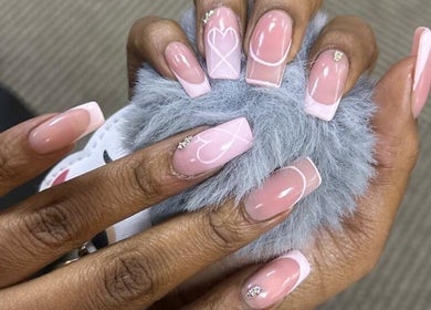 Close-up of elegant pink nail art at SK Nail and Beauty Bar, Soweto, Gauteng, ZA.