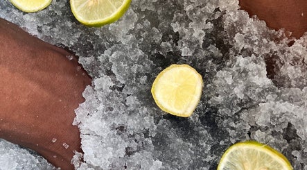 Foot spa with ice and lime slices at Glam Spot Aesthetics, La Brea, Siparia Regional Corporation, TT.