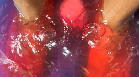 Invigorating foot soak at Glam Spot Aesthetics, La Brea, Siparia Regional Corporation, TT with vibrant colors.