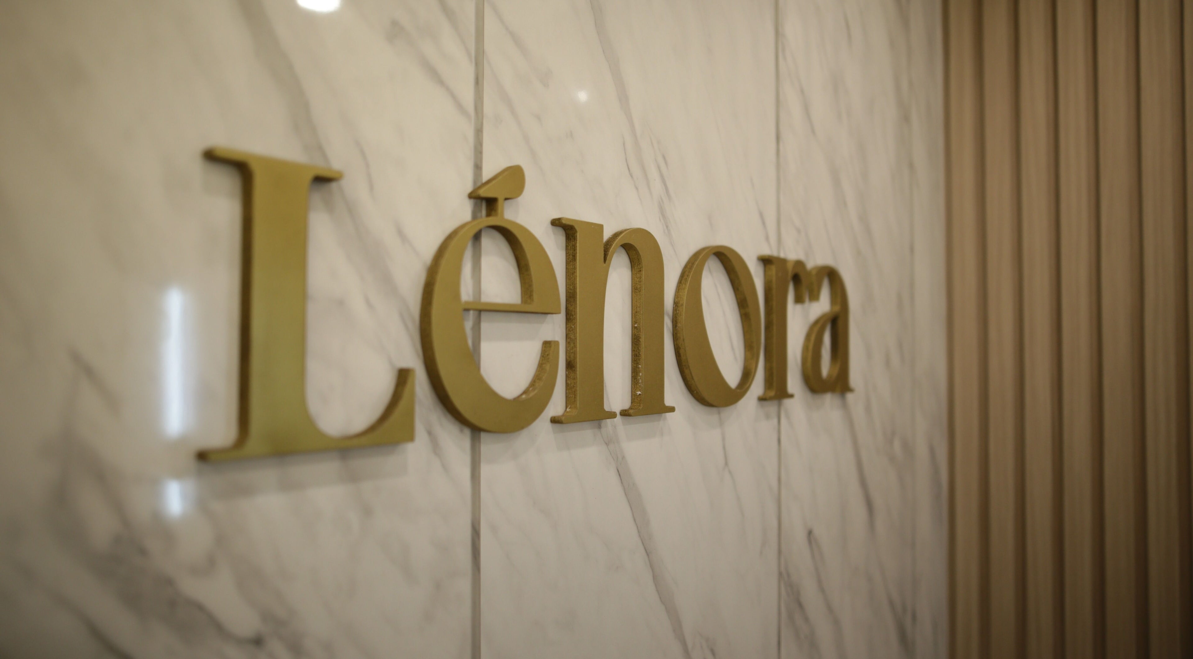 LENORA BEAUTY STUDIO sign on marble wall, Bali, Bali, ID, symbolizes elegance and style.