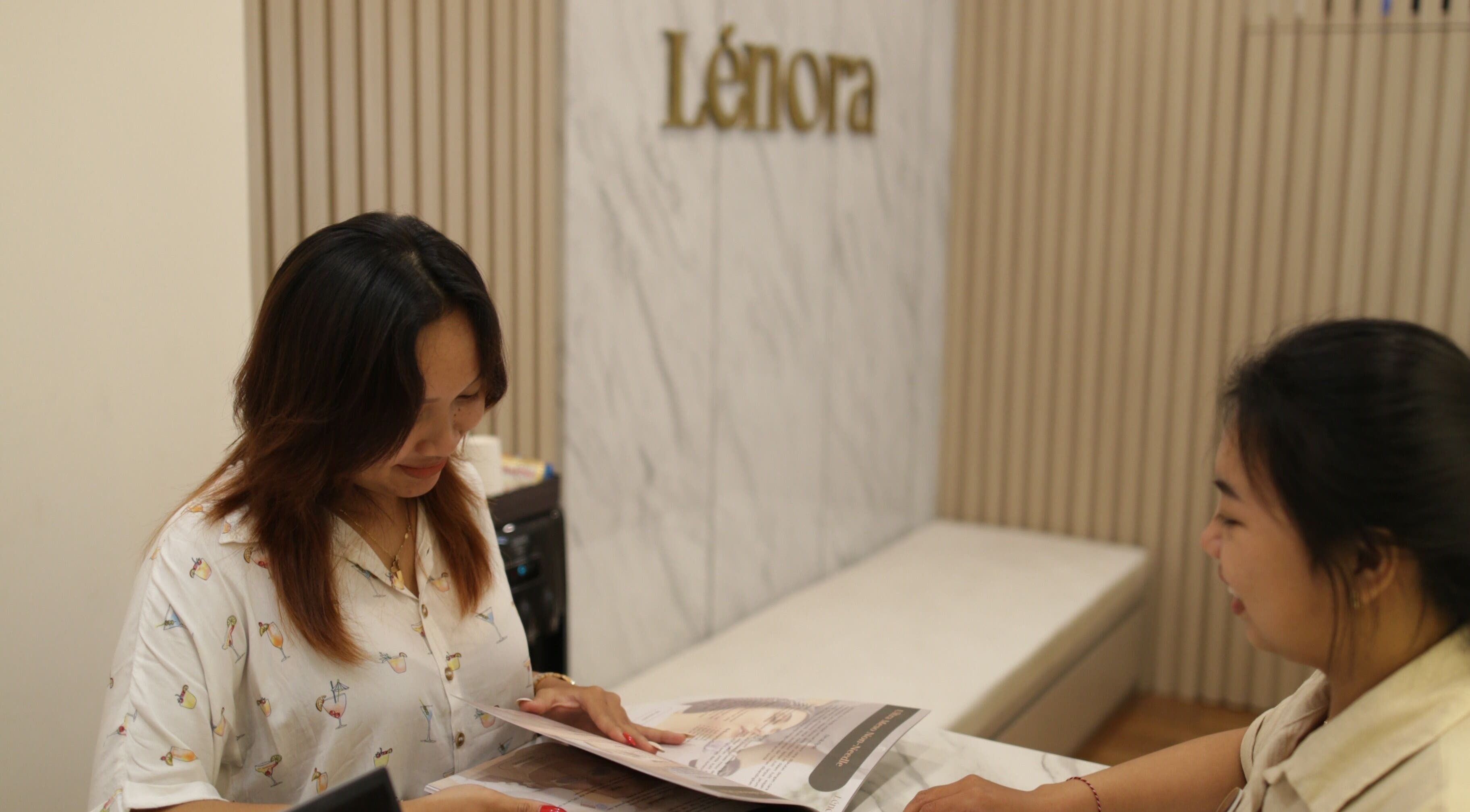 Reception at LENORA BEAUTY STUDIO in Bali, Bali, ID showing friendly staff assisting a client.