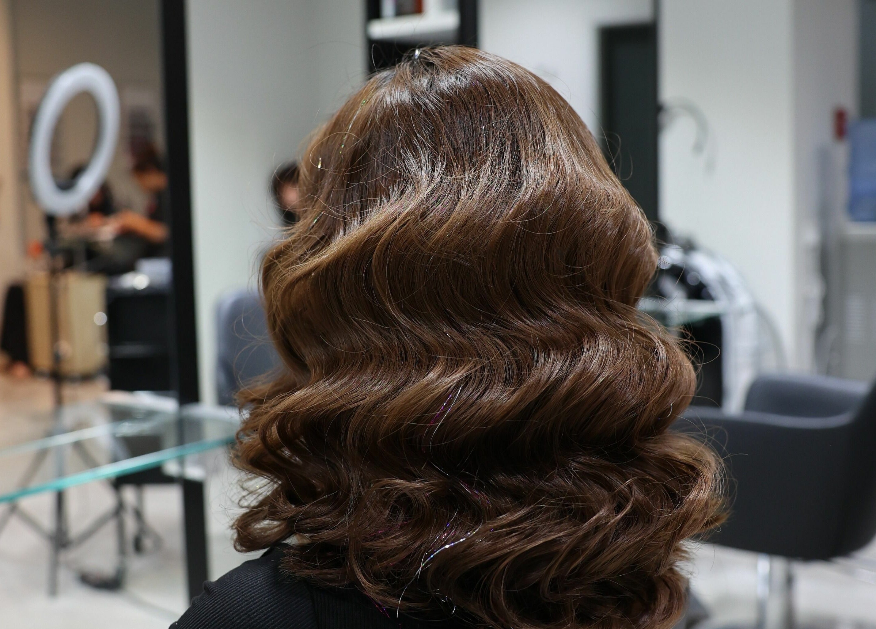 Luscious wavy hairstyle at Artistic Trendz Hair and Beauty Salon, Dubai, AE, showcasing expert styling.