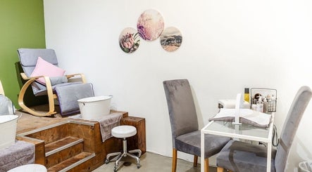 Peaceful nail treatment area at Perfectly Beautiful, Bloemfontein, Free State, ZA with comfy chairs and decor.