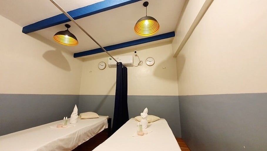 Relaxing massage room at Northern Spa - Cabanatuan City, with cozy twin beds in Central Luzon, PH.