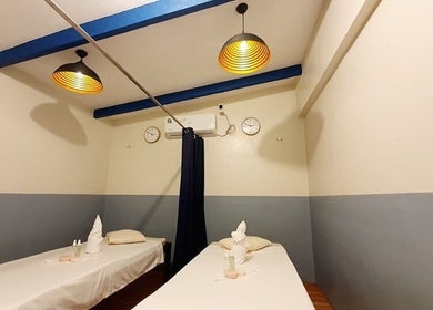 Relaxing massage room at Northern Spa - Cabanatuan City, with cozy twin beds in Central Luzon, PH.
